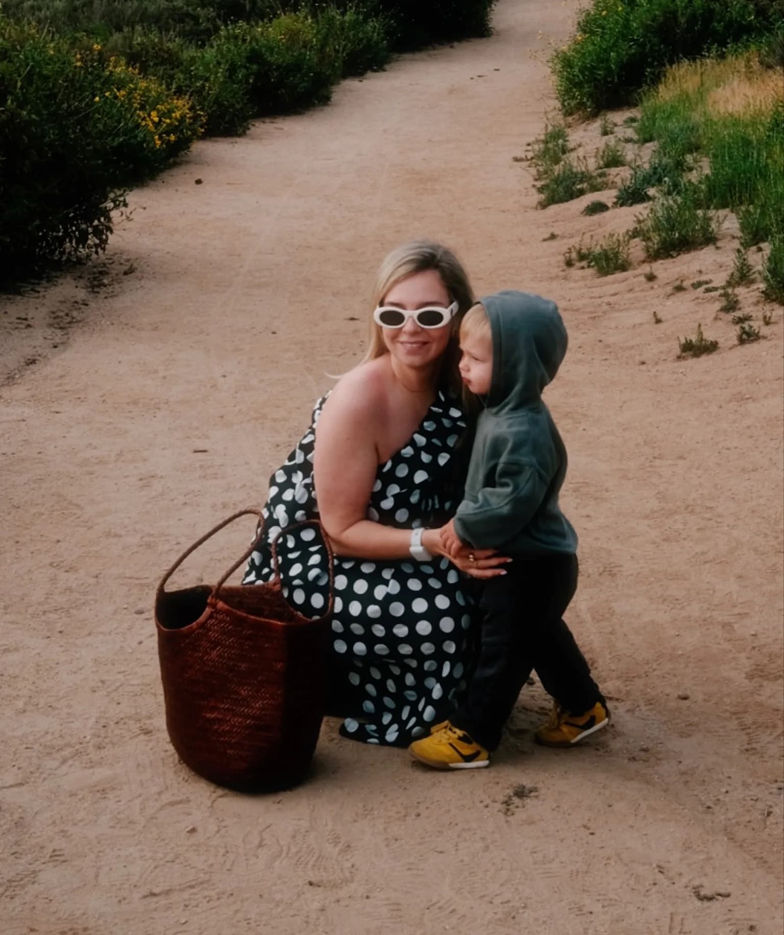 Yana, founder of Thyro, walking a path with her son